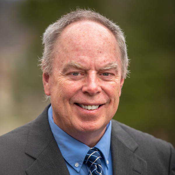 Dennis M. Huggins